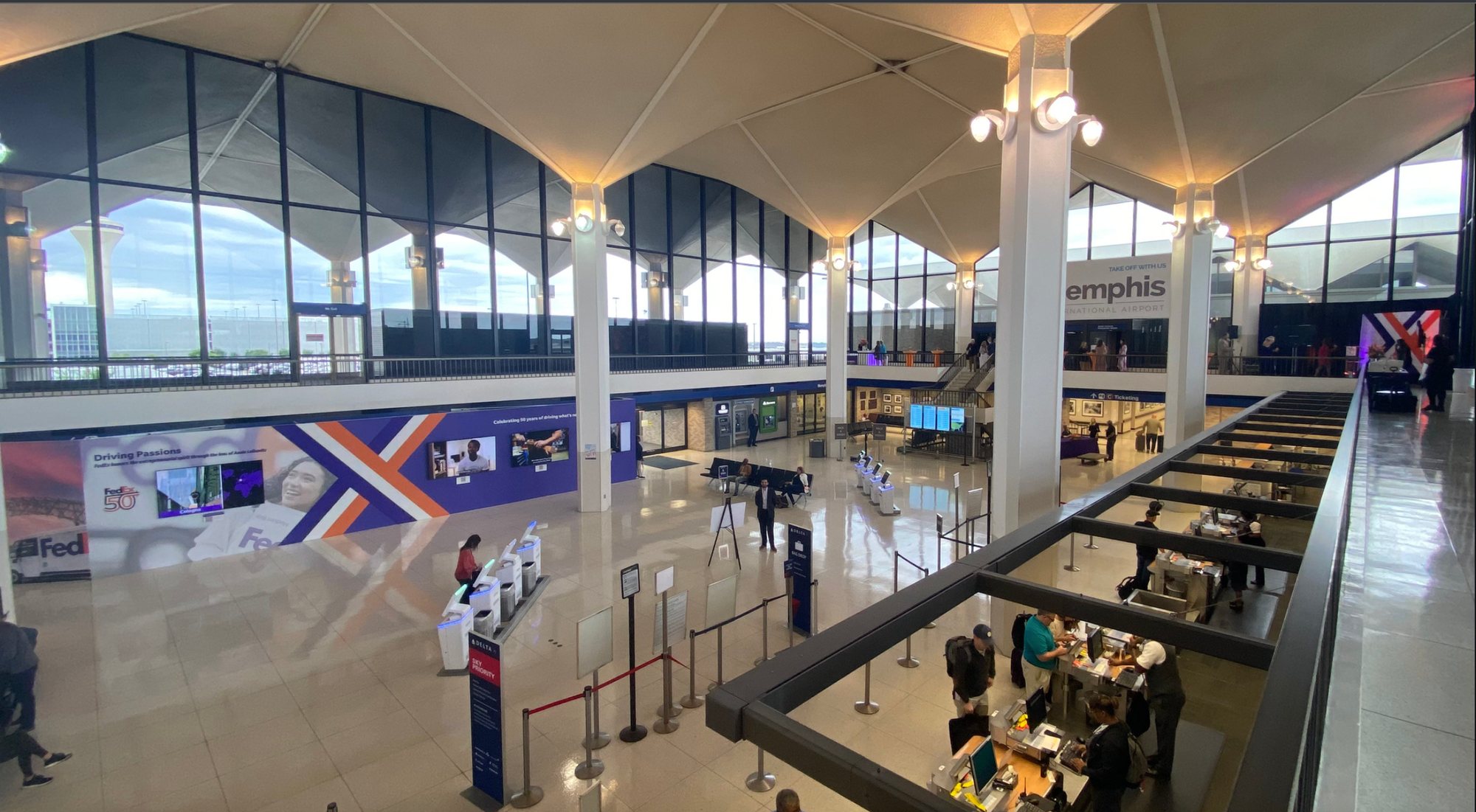 The Driving Passions exhibition wall in the Memphis International Airport terminal