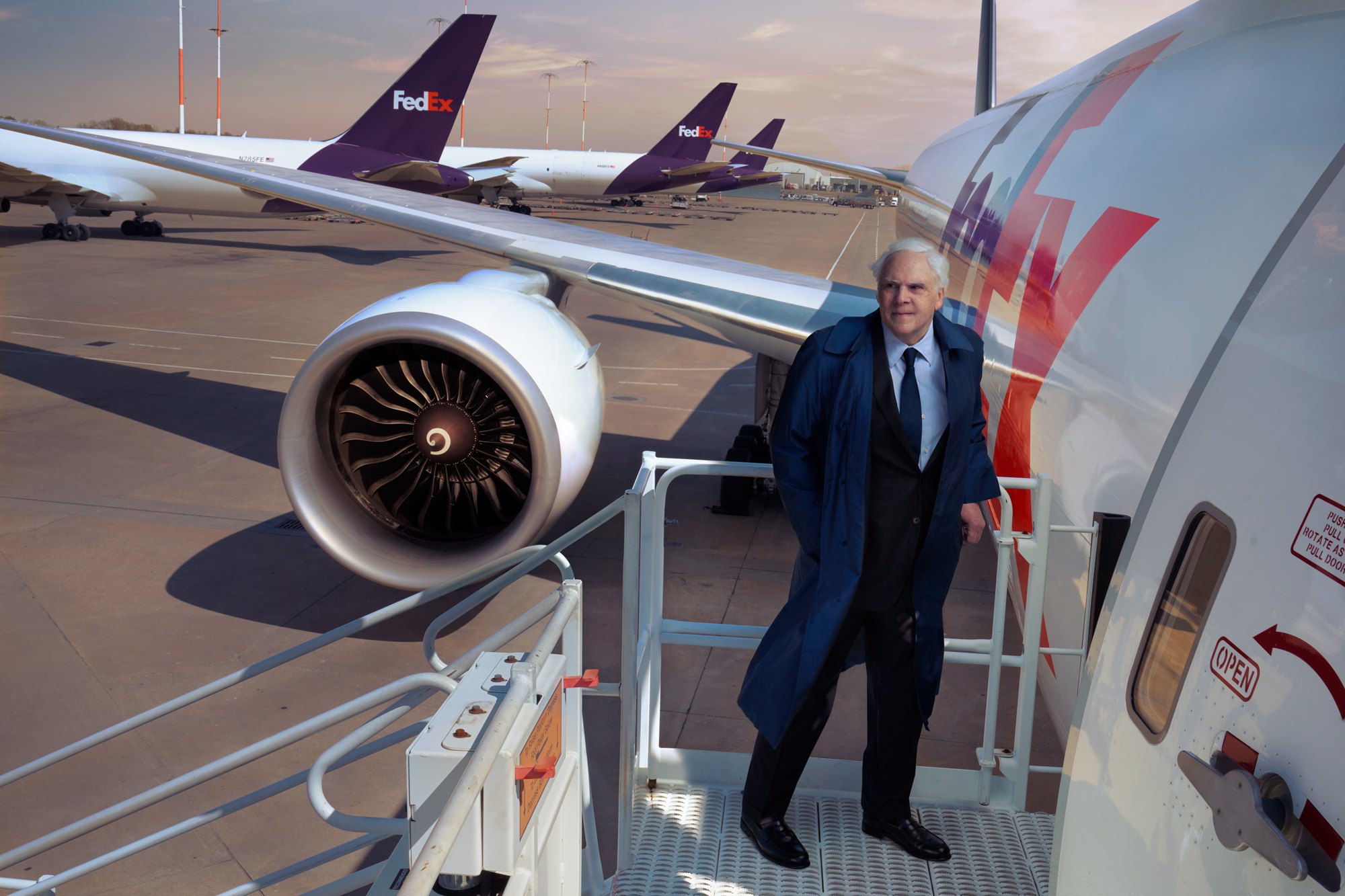 Annie Leibovitz portrait of FedEx founder Frederick W. Smith on the airstairs of a FedEx aircraft in Memphis, 2023