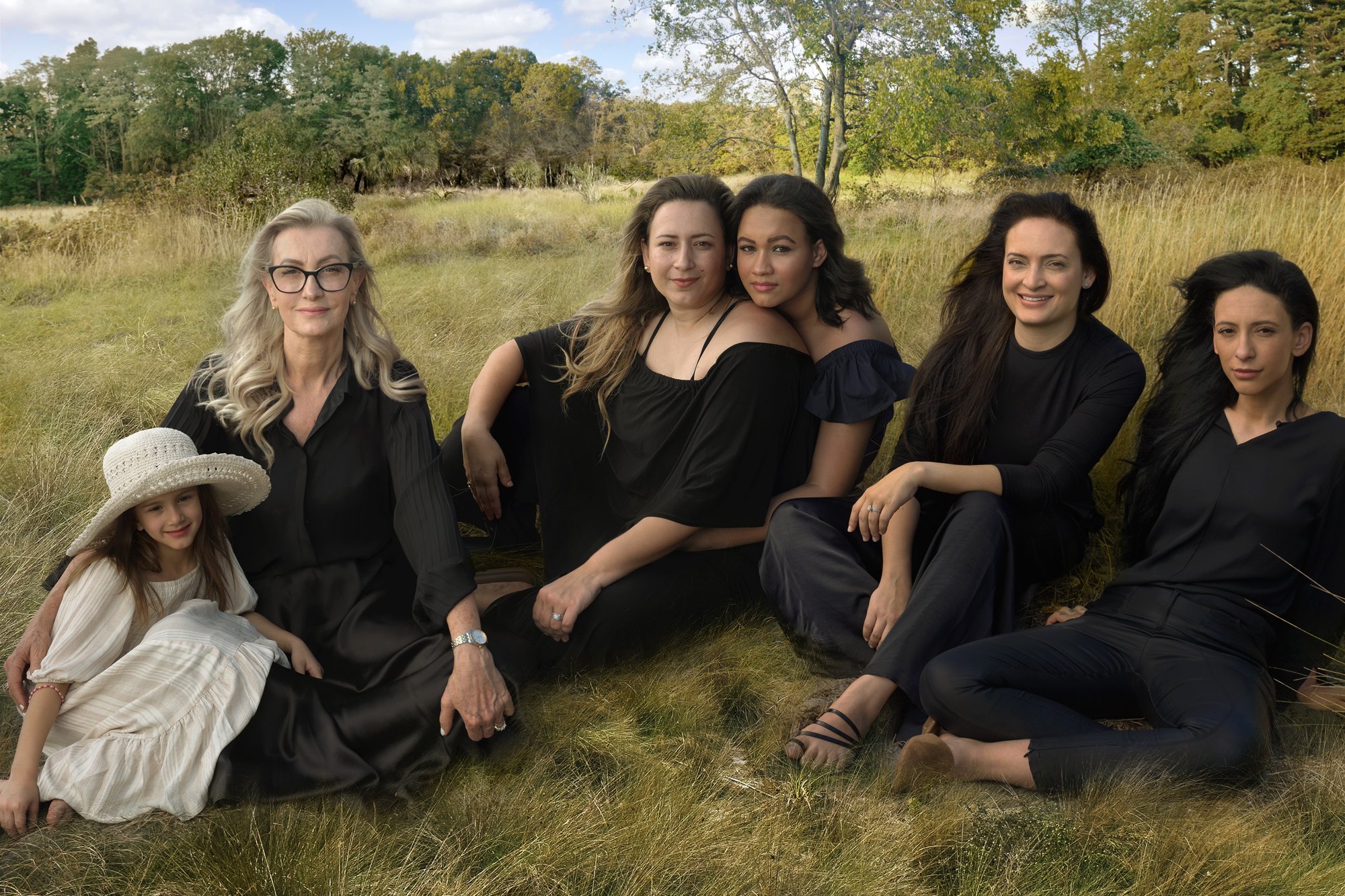 Three generations of the Terra Beauty Bars family in a meadow