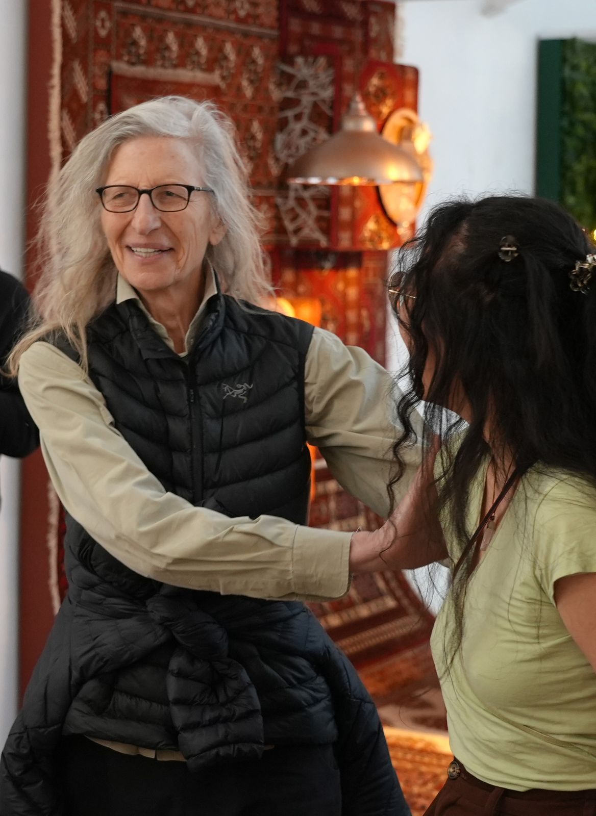 Annie Leibovitz greets a guest at the IKEA+ launch