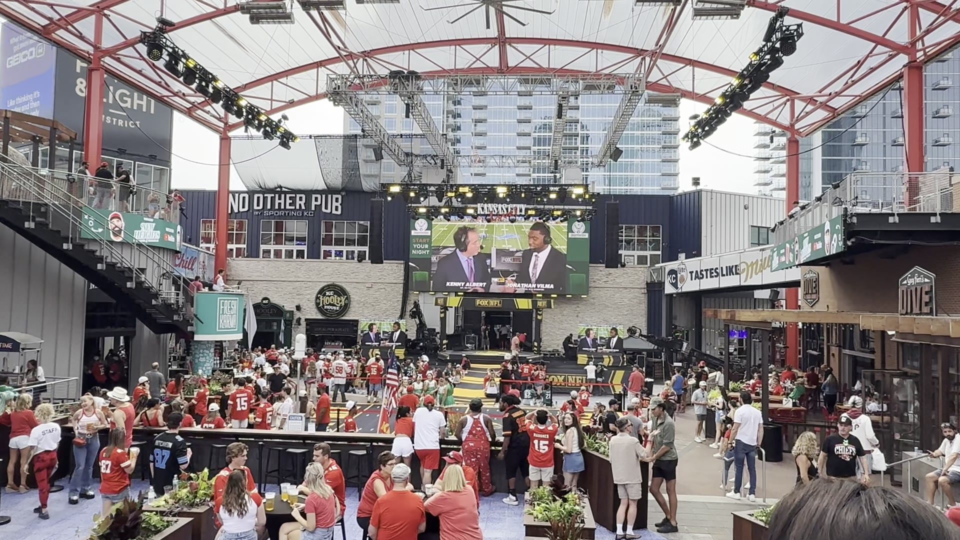 The KC Live! courtyard on game day with New Heights creative on the venue screens