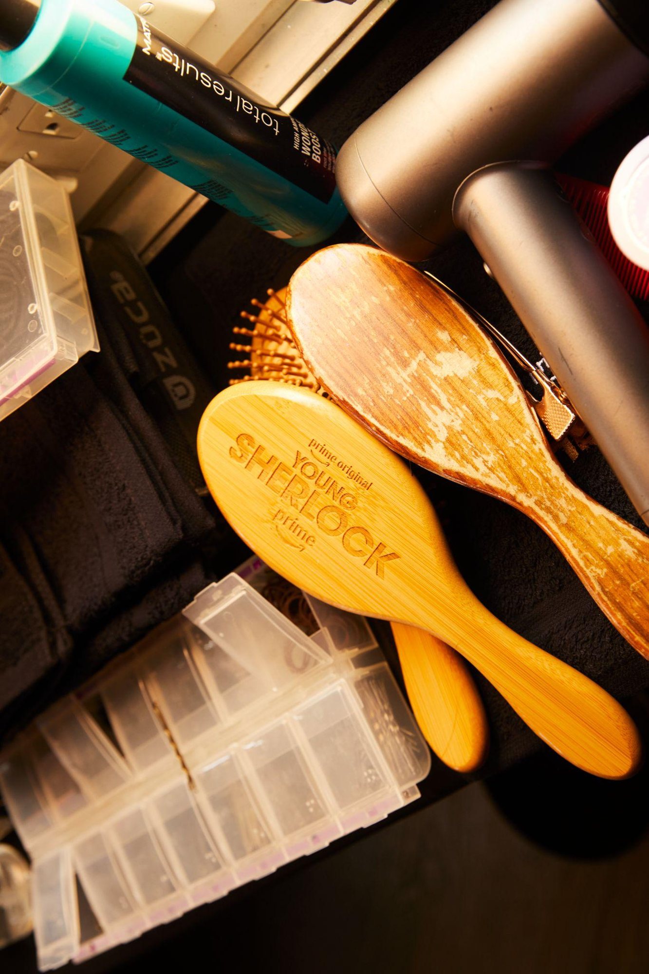 Branded hair brushes at a styling station