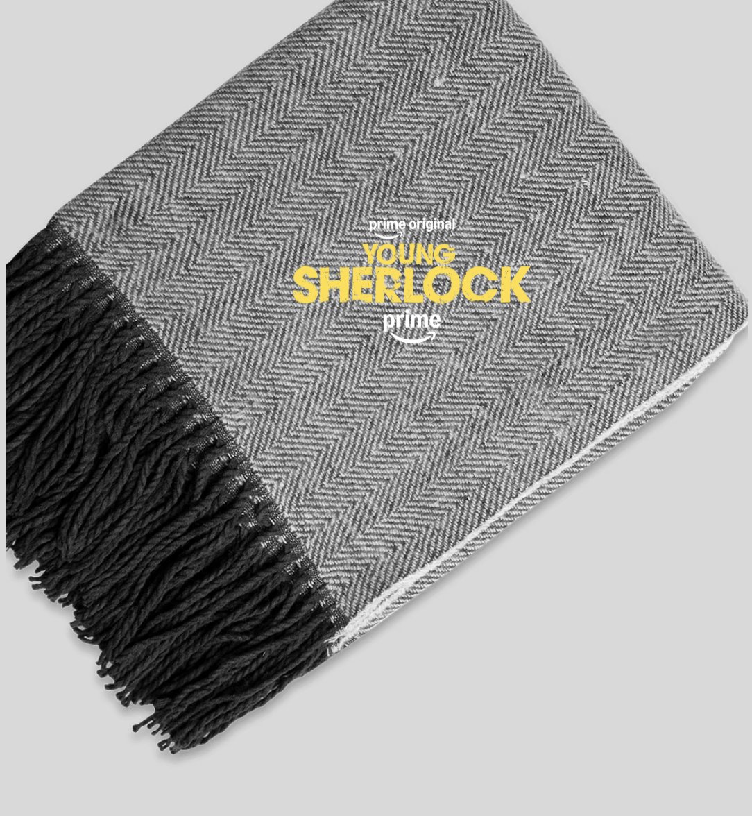 A Young Sherlock branded blanket for the pedicab ride