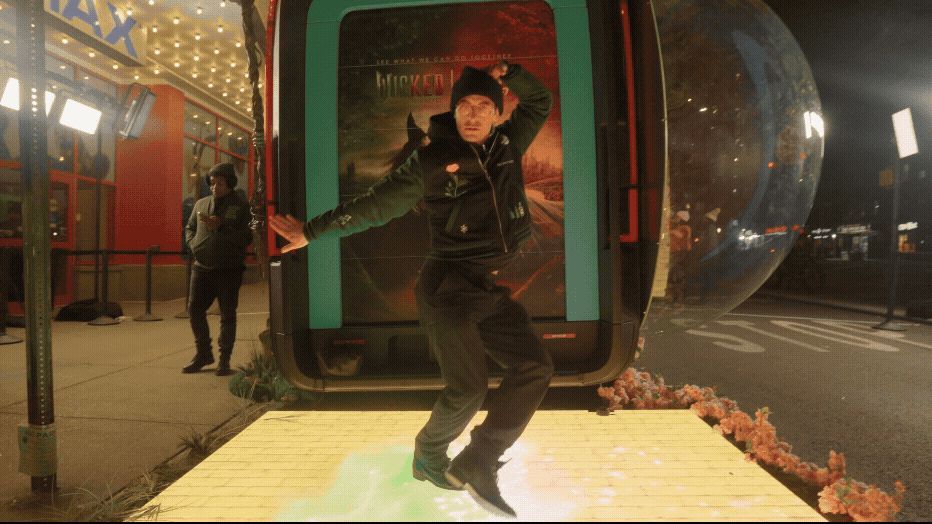 A fan performing inside the Wicked Cam video booth