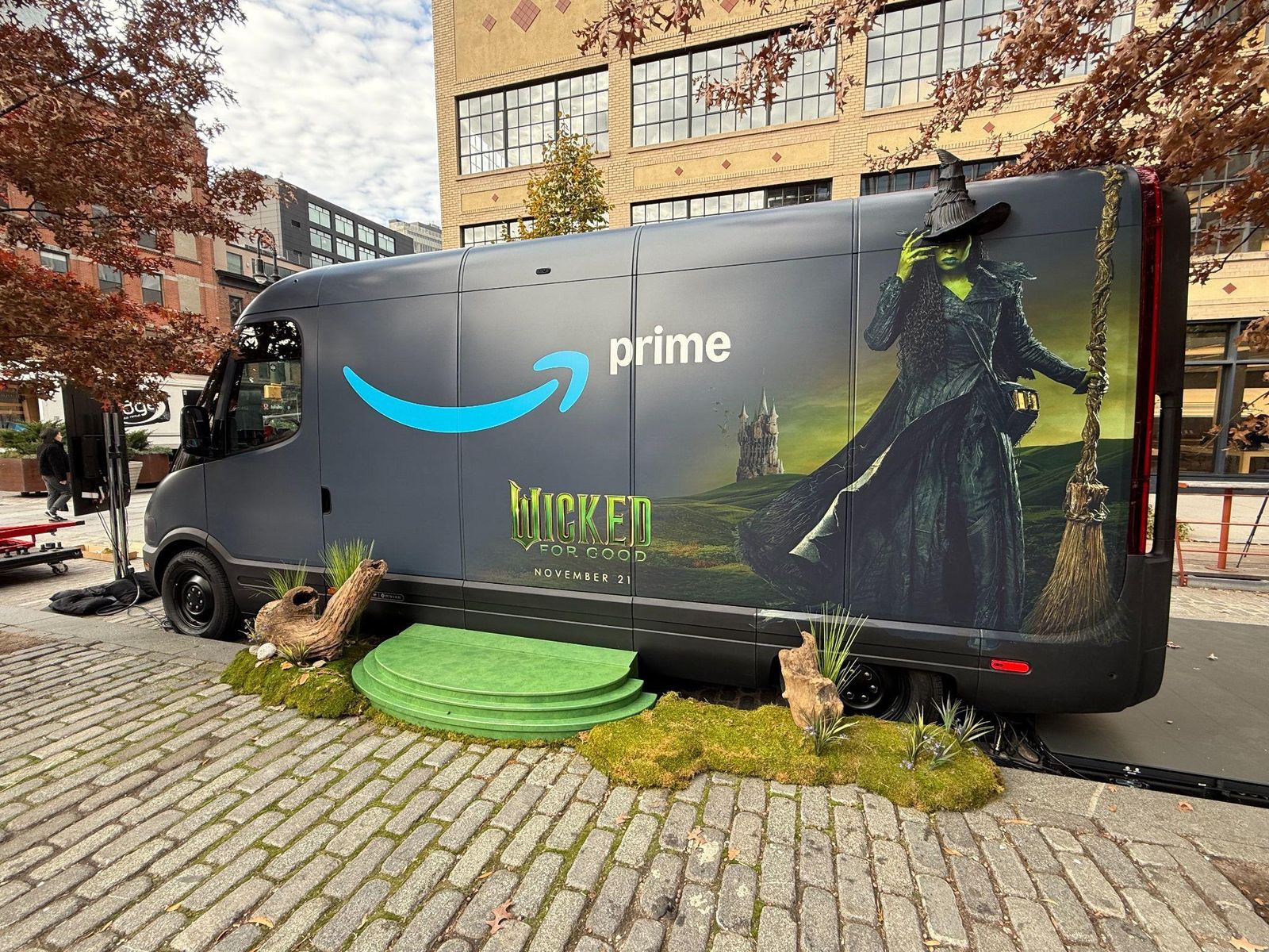 The co-branded Wicked Prime Van parked on a cobbled street